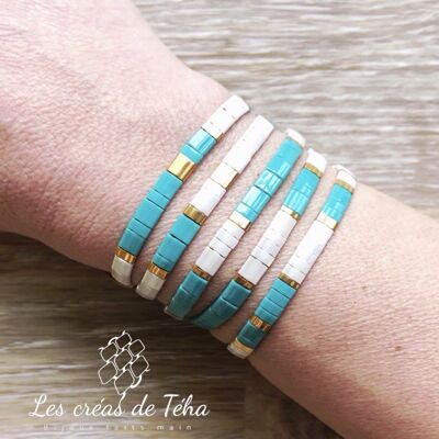 Bracelet Huira turquoise, blanc et doré en perles de verre et cordon Modèle 1