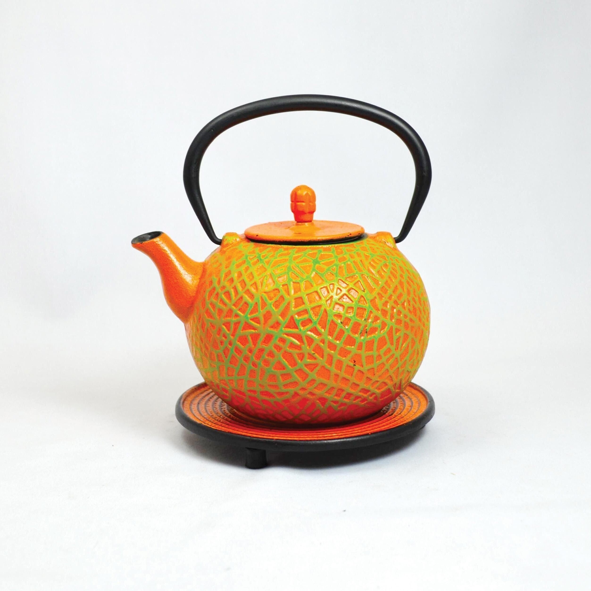 Teiera Messhu in ghisa 0,8 l arancione/verde chiaro con piattino
