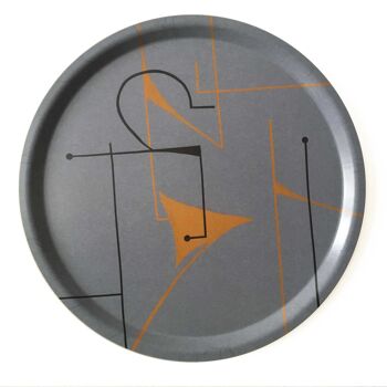 Plateau rond gris-bleu avec motif de découpe de papier noir-orange