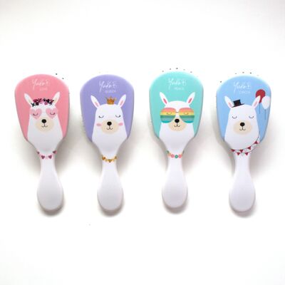 Children's hairbrushes in the shape of a llama