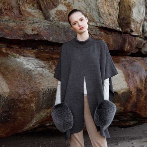 KNITTED PONCHO WITH FUR POCKETS