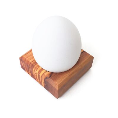 Square egg holder made of olive wood