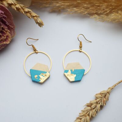 Golden circle and wooden hexagon earrings painted in lagoon blue, golden gilding chips