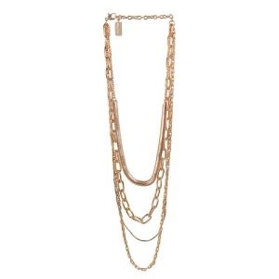 Mixing Inaya necklace with layers of metal