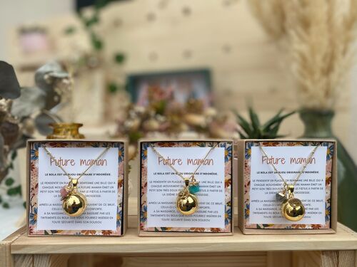 Gold-plated pregnancy bola with tree of life and stones