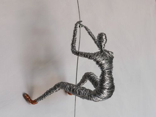 Climbing Man Sculpture with Copper Shoes