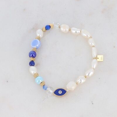 Elastic golden Huyana bracelet with blue ceramic