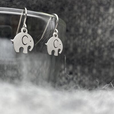 Peaceful rhodium silver elephant earrings