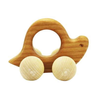 Clutching toy snail made of wood