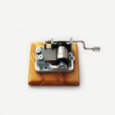 Wooden music box with hand crank "Every year again"