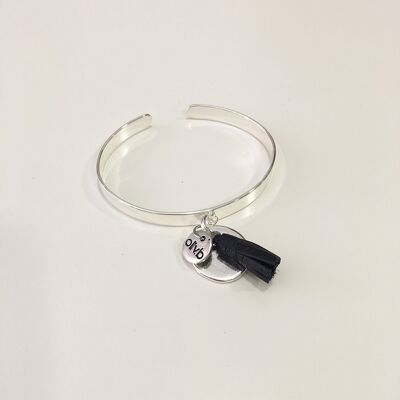 Bracciale semirigido placcato argento con medaglia e nappina in pelle