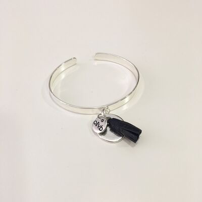 Silver plated half bangle bracelet with medal and leather tassel