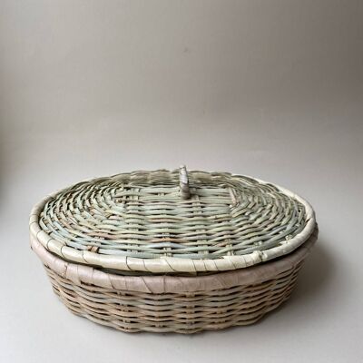 Decorative basket with a lid, oval, hand-woven from palm