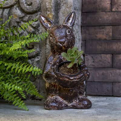 Flower pot made of clay rabbit standing