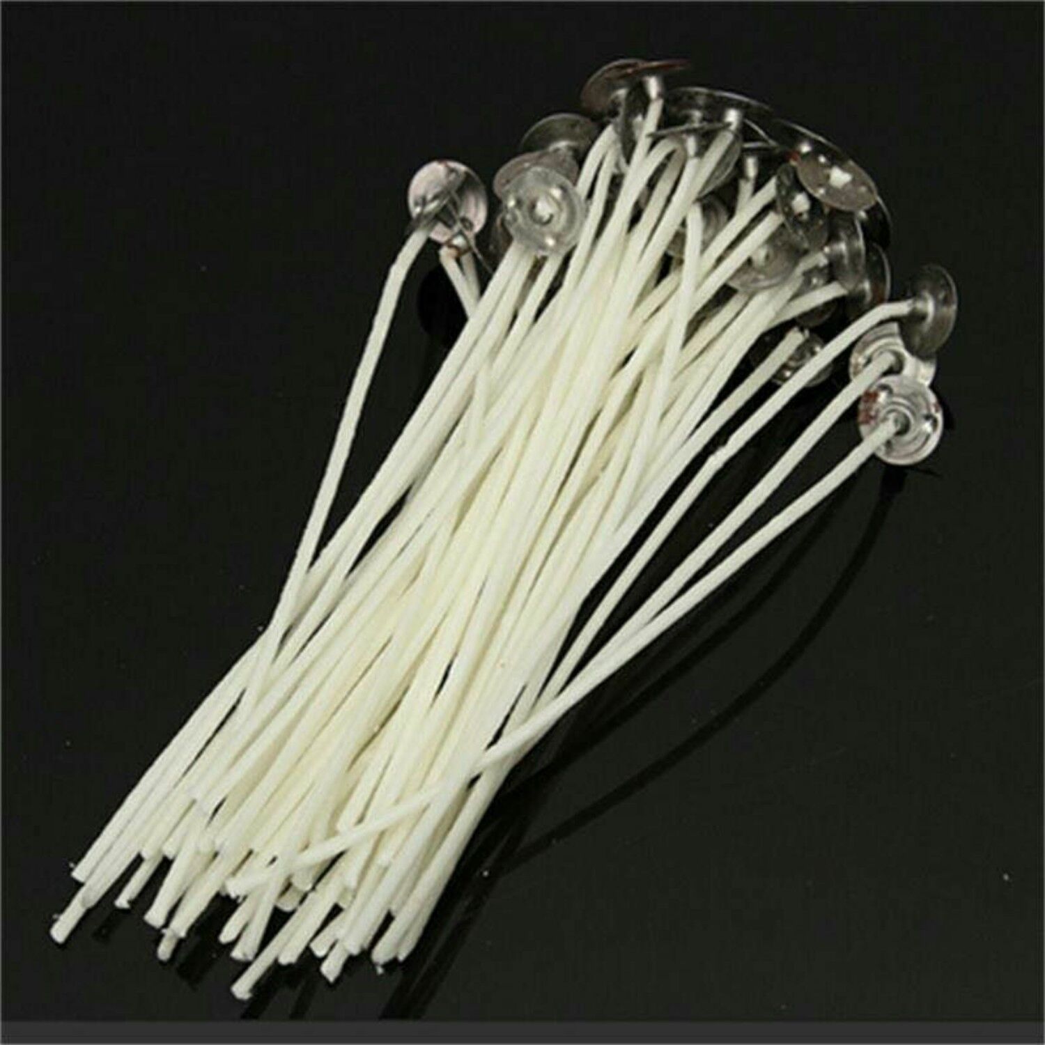 Lot von 10 Dochten, montiert auf einem Sockel und gewachst