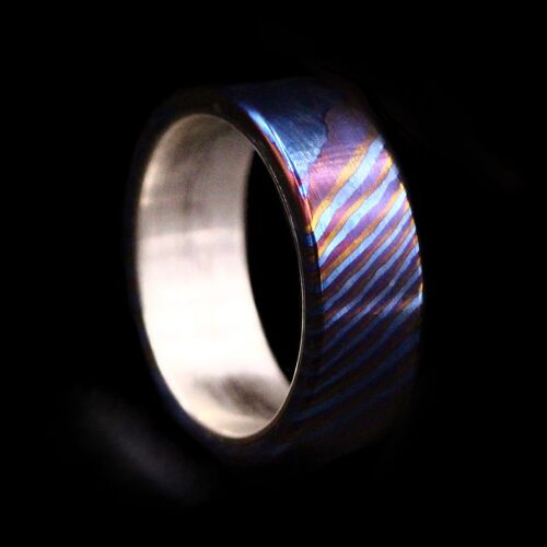 Titanium Damascus / Pattern Welded Ring with Sterling Silver Insert Z1