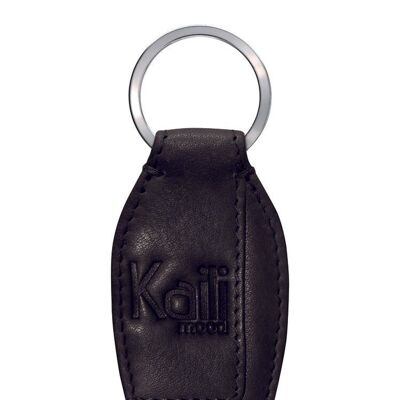 K10753AB | Keychain in genuine full grain leather, with slight grain. Black colour. Polished Nickel ring. Total dimensions: 3.5 x 9 x 0.5 cm. Packaging: rigid bottom/lid Gift Box