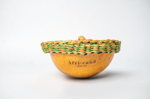 Unrefined Shea Butter from Ghana in calabash with elephant grass cover