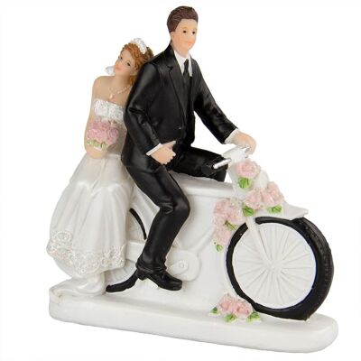 Figure de mariage sur un vélo