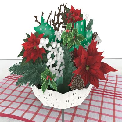 Tarjeta emergente de cesta de flores navideñas