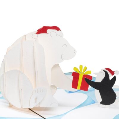 Tarjeta emergente navideña con oso polar y pingüino