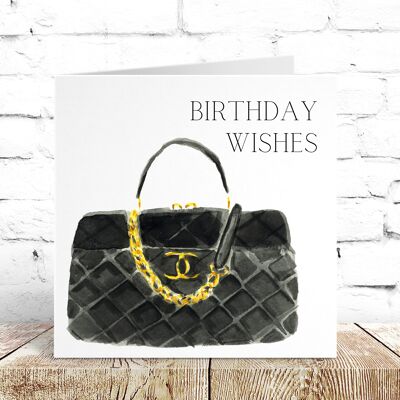 Carte de souhaits d'anniversaire de sac à main noir