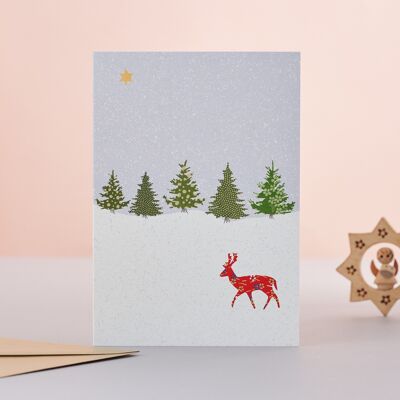 Tarjeta de Navidad de ciervo en la nieve