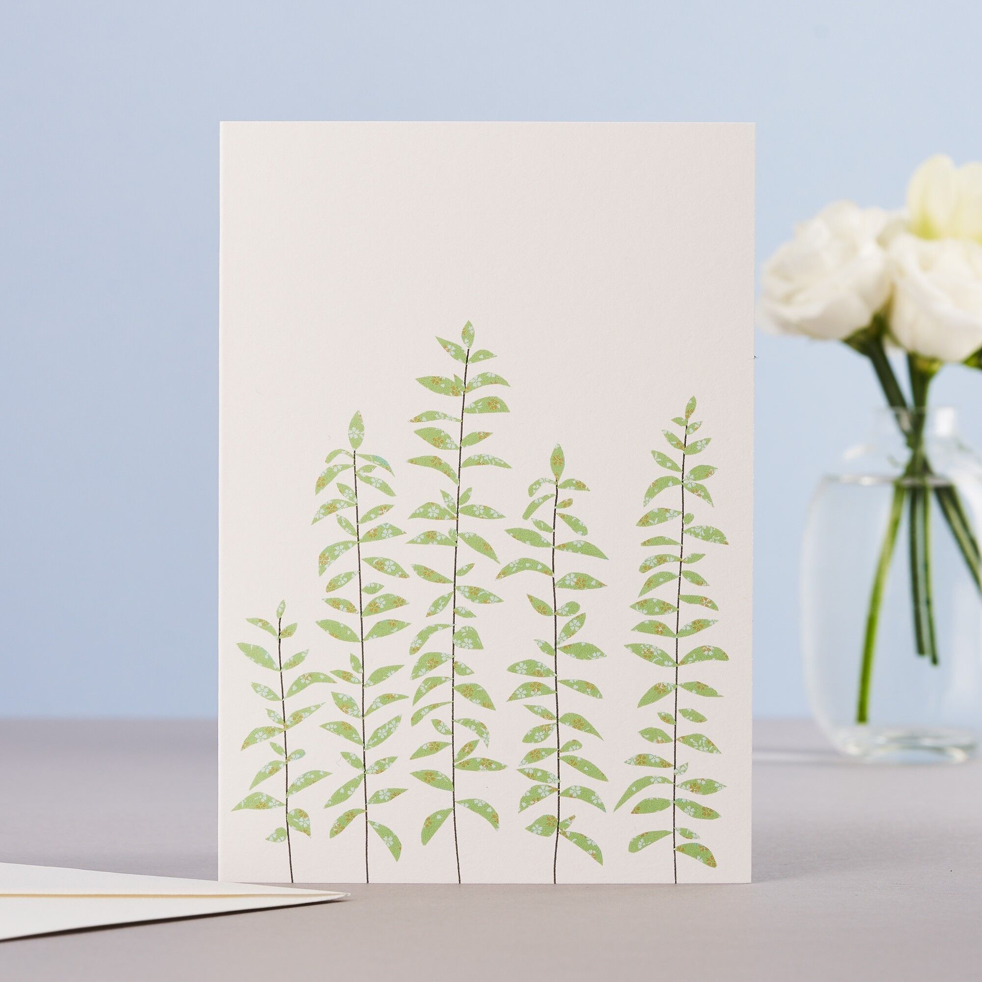 Biglietto con foglie di tè