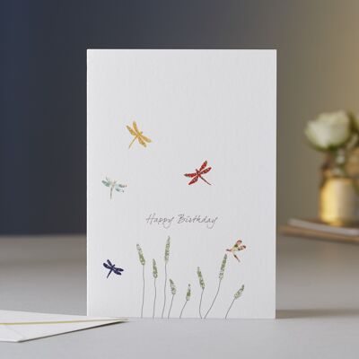 Tarjeta de cumpleaños de libélulas y hierba