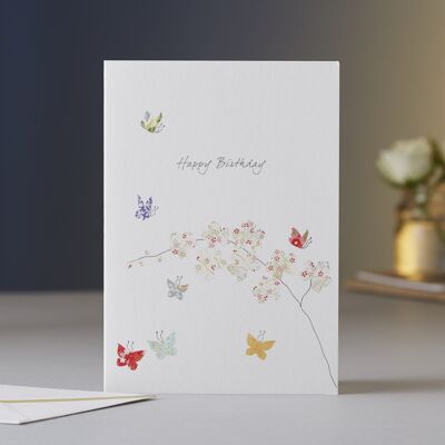 Tarjeta de cumpleaños de mariposas y orquídeas