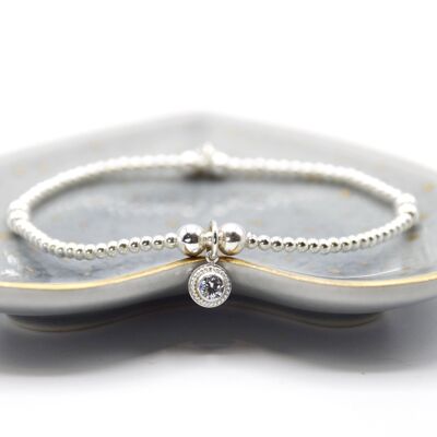 Sterling Silver bead bracelet with a midi clear decorative CZ gem charm
