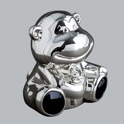 Money box in silver metal The little monkey