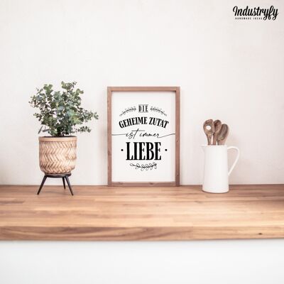 Farmhouse Design Schild "Die geheime Zutat ist immer Liebe" - 42x30 - mit Rahmen