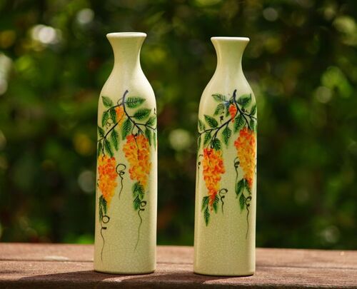 Orange string flowers bottle vase