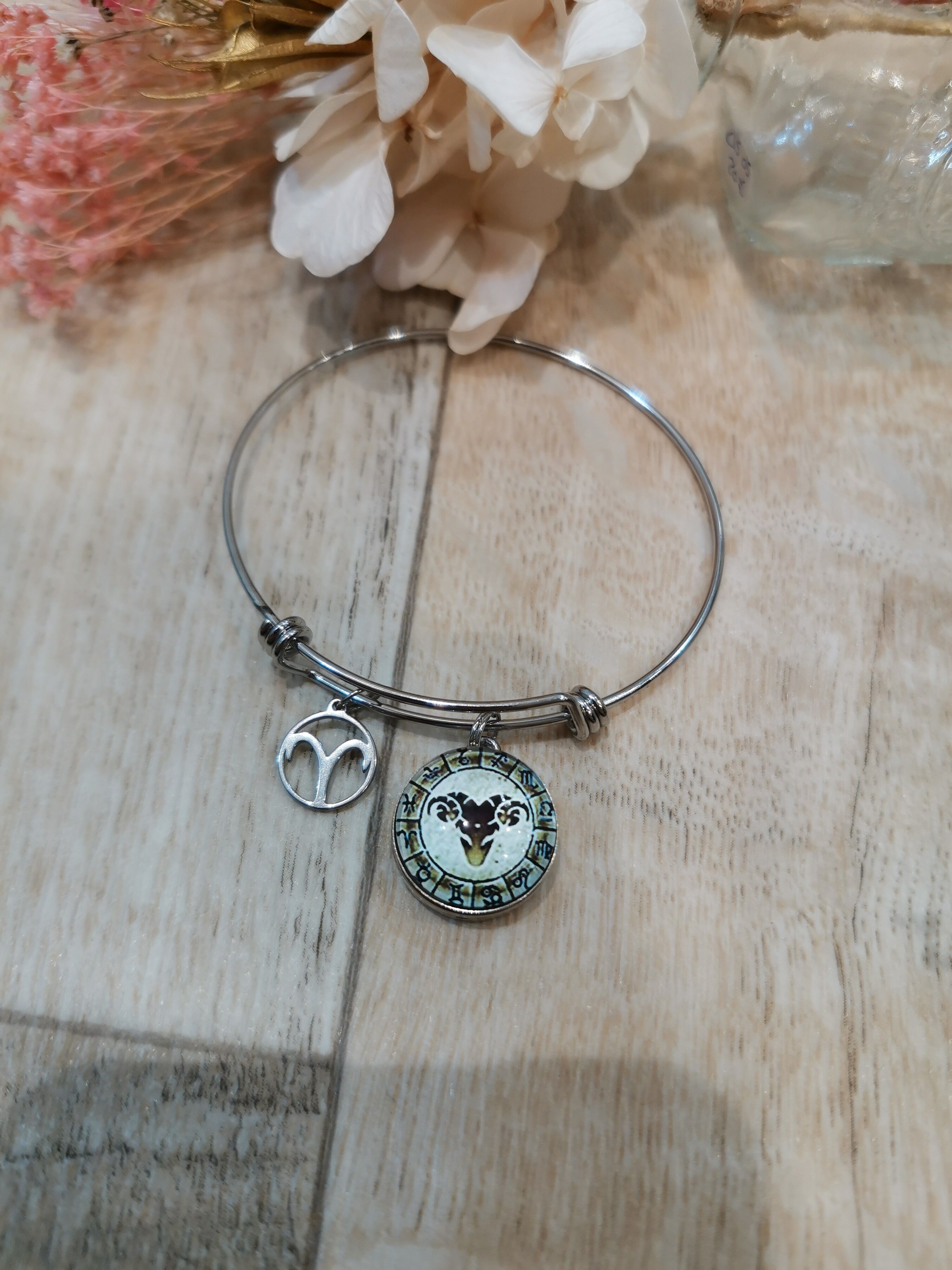 Bracciale in acciaio con segno zodiacale