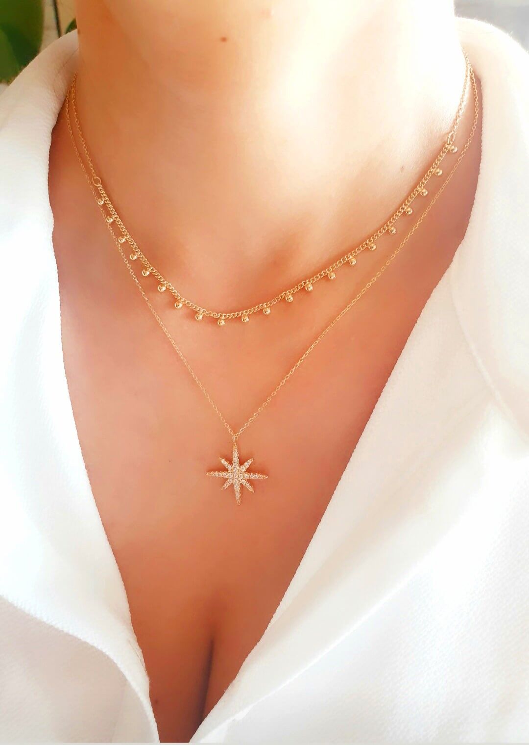 Collana placcata oro con nappe a sfera