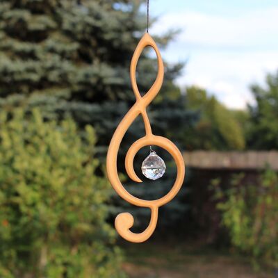 Wooden treble clef window decoration with crystal