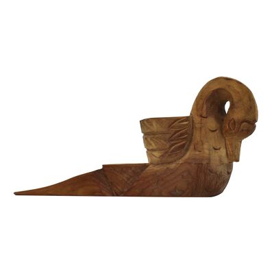 Wooden swan doorstop in Indonesian style