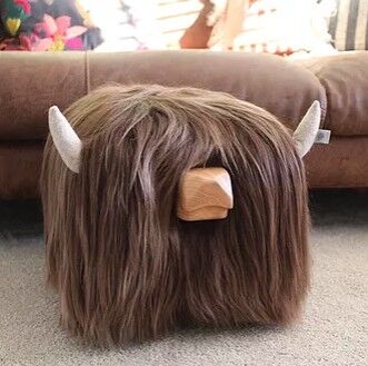 Fluffy highland shop cow footstool