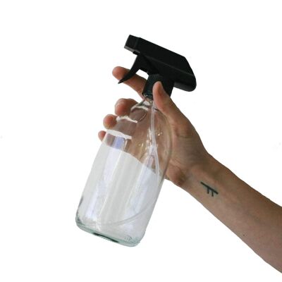 Botella de vidrio transparente con tapa de spray