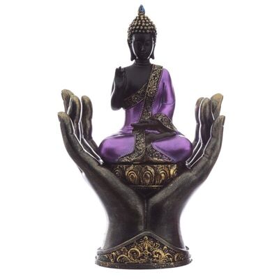 Buda tailandés púrpura y negro en las manos
