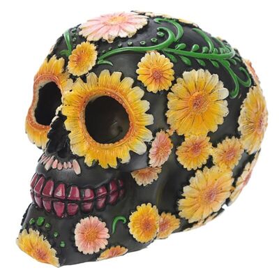 Cabeza de calavera del día de los muertos con motivo floral de margaritas