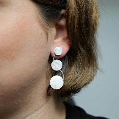 Earrings three brushed silver orbits different sizes