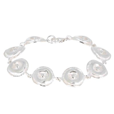 Multiple round silver bracelet in smooth and crumpled silver