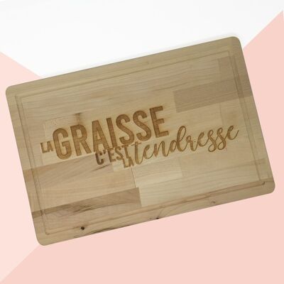 Cutting board engraved "Fat is tenderness"