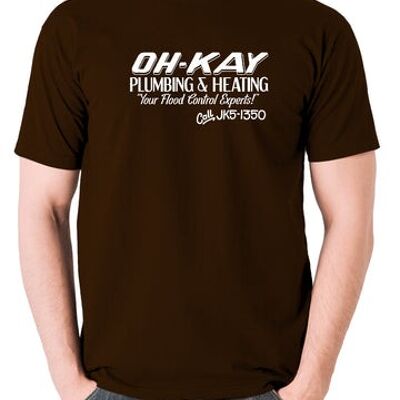 Camiseta inspirada en Home Alone - Oh-Kay Plumbing And Heating Your Flood Control Experts chocolate