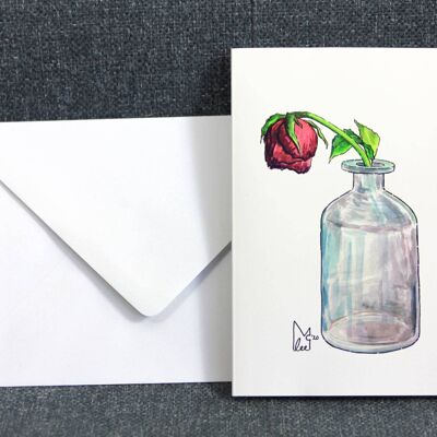 Dead rose in glass bottle Greeting card