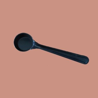 Plastic measuring spoon for coffee