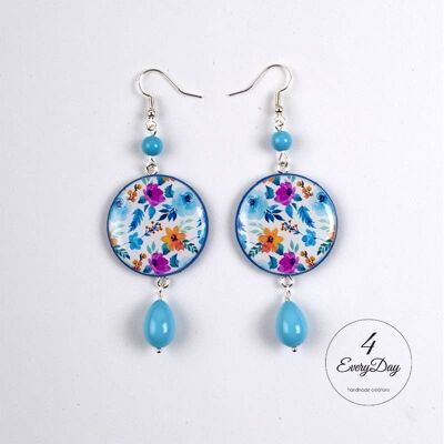 Pendientes: varias flores azules