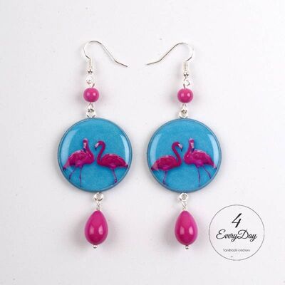 Earrings: flamingos on a light blue background